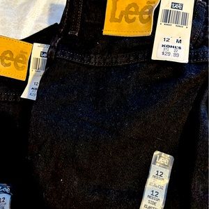 Ladies jeans.  Two new with tags, one gently used